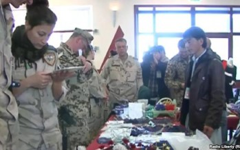Exhibition of Afghan women’s handicrafts in an ISAF camp