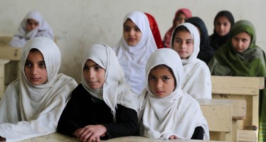Afghan students enjoy a roof over their heads at school